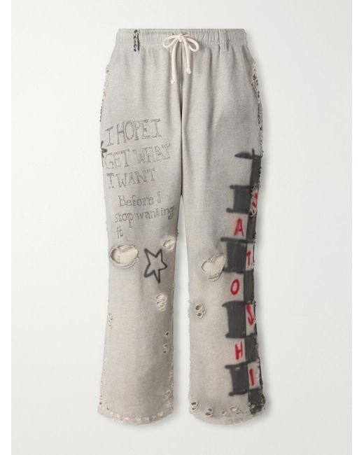 Satoshi Nakamoto White Get What I Want Printed Embellished Distressed Cotton-jersey Sweatpants for men