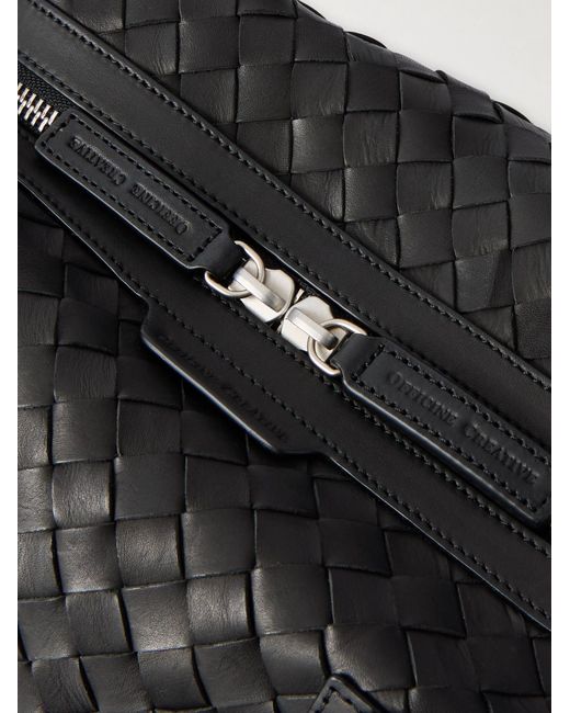 Officine Creative Black Woven Leather Weekend Bag for men