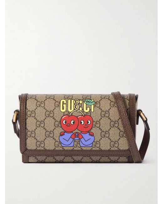 gucci leather trimmed monogrammed coated canvas messenger bag