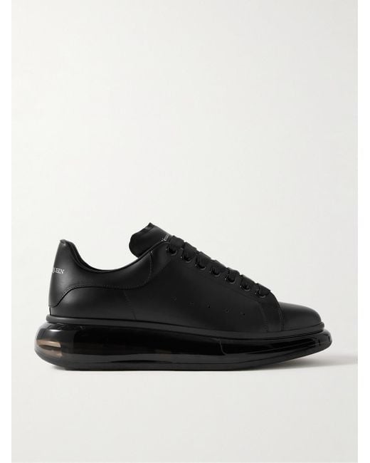 Sneakers in pelle con suola oversize di Alexander McQueen in Black da Uomo