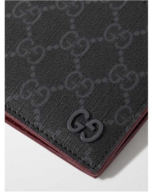 Portafoglio in tela spalmata e pelle zigrinata con monogramma GG Supreme di Gucci in Black da Uomo