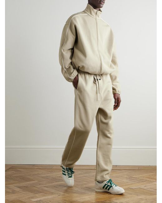 Fear Of God Schmal zulaufende Jogginghose aus Jersey aus einer Baumwollmischung mit Logoapplikation in Natural für Herren