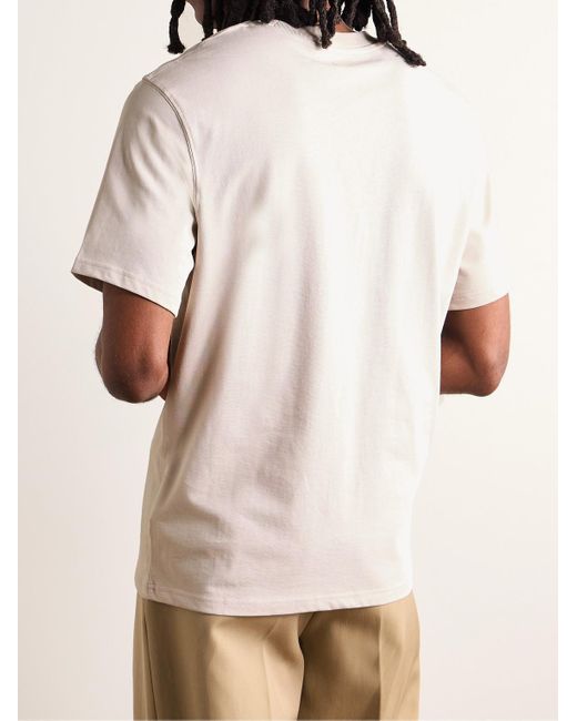 T-shirt in jersey di cotone con logo goffrato di AMI in White da Uomo