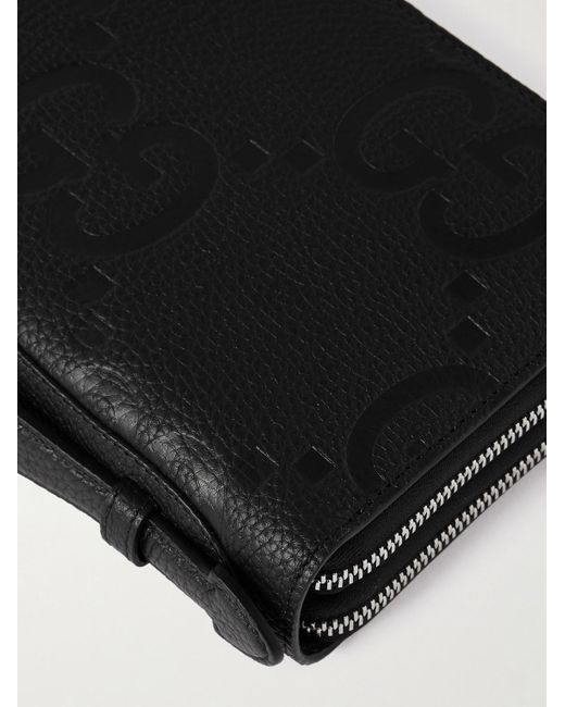 Gucci Reiseportemonnaie aus vollnarbigem Leder mit Logomuster in Black für Herren