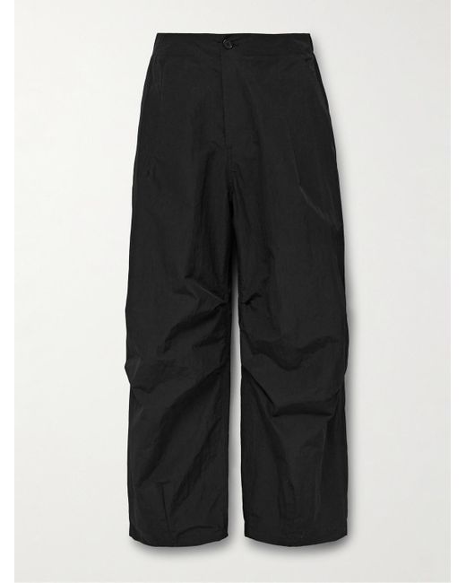 Pantaloni a gamba larga in micro-ripstop di misto nylon con pinces di Amomento in Black da Uomo