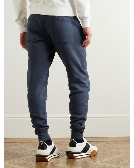 Tom Ford Blue Tapered Garment-Dyed Cotton-Jersey Sweatpants for men