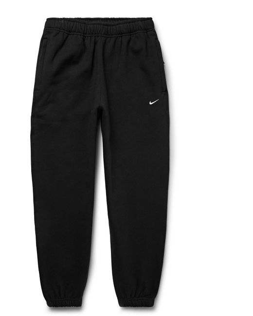 Nike Black Solo Swoosh Tapered Logo-embroidered Cotton-blend Jersey Sweatpants for men