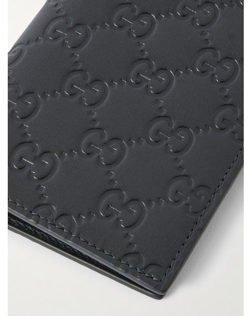 Arabella Logo-Debossed Leather Passport Case di Gucci in Black da Uomo
