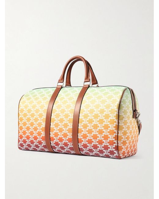 Medium Voyage Leather-Trimmed Logo-Print Coated-Canvas Holdall di Céline in Natural da Uomo
