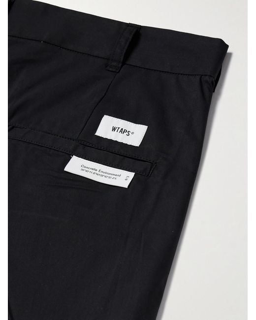 (w)taps Blue Tapered Logo-Appliquéd Cotton-Blend Trousers for men
