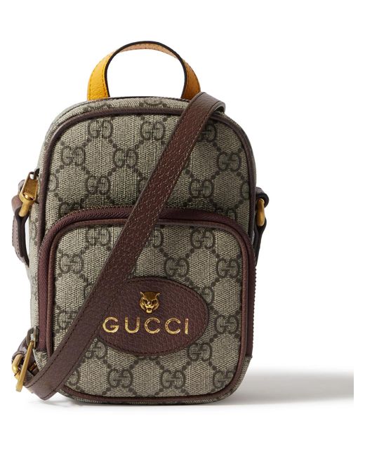Gucci Leather-trimmed Monogrammed Coated-canvas Messenger Bag in Brown ...