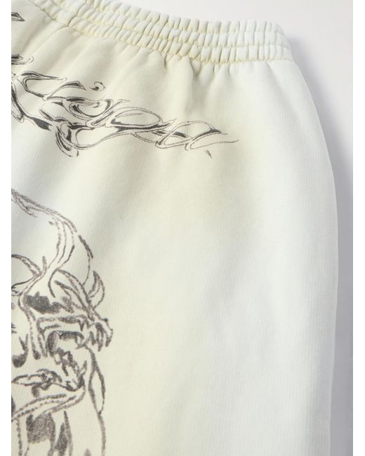 Balenciaga White Wide-leg Printed Distressed Cotton-jersey Sweatpants for men