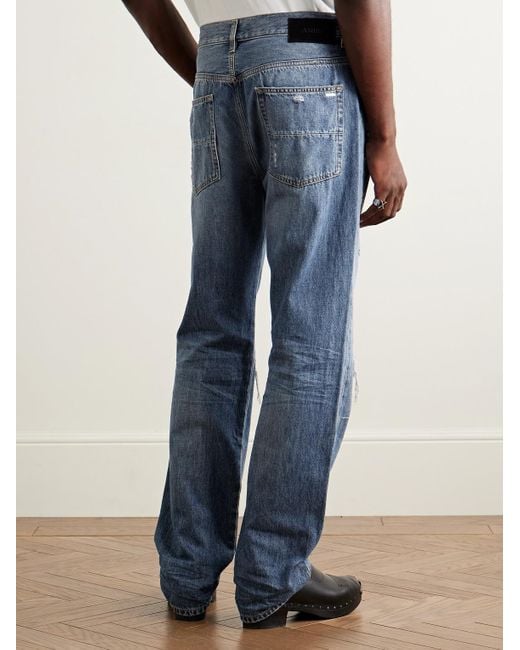 Jeans A Gamba Dritta Effetto Consumato Con Inserti Mx1 di Amiri in Blue da Uomo