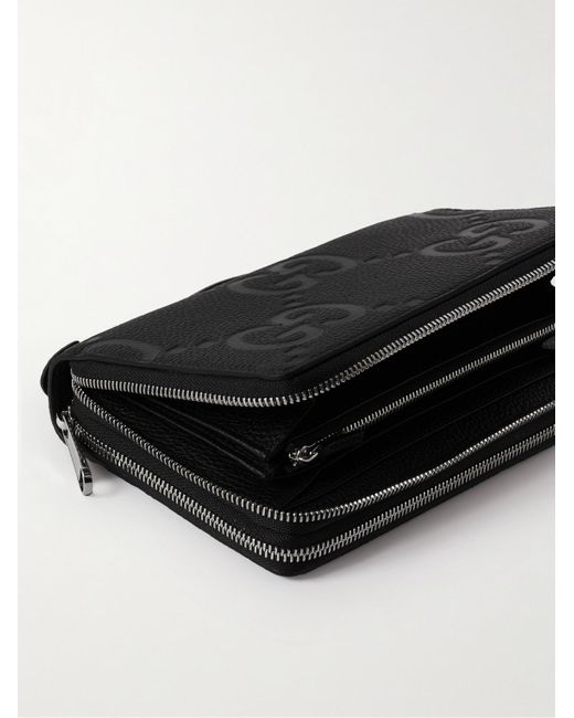 Gucci Black Monogrammed Full-grain Leather Travel Wallet for men