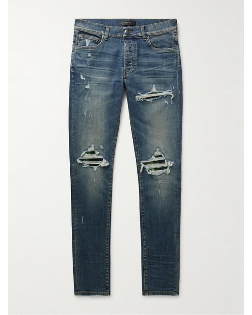 Amiri MX1 Skinny Jeans mit Einsätzen in Distressed-Optik in Blue für Herren