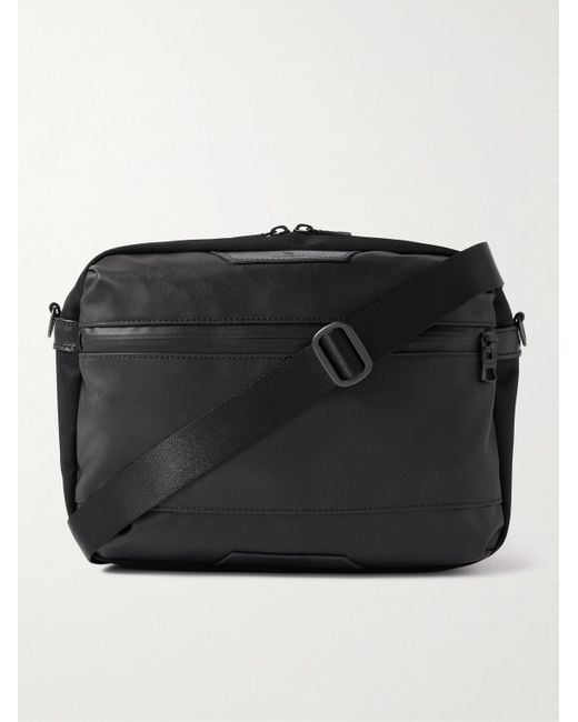 Progress Leather-Trimmed Coated Nylon-Twill Messenger Bag di Master Piece in Black da Uomo