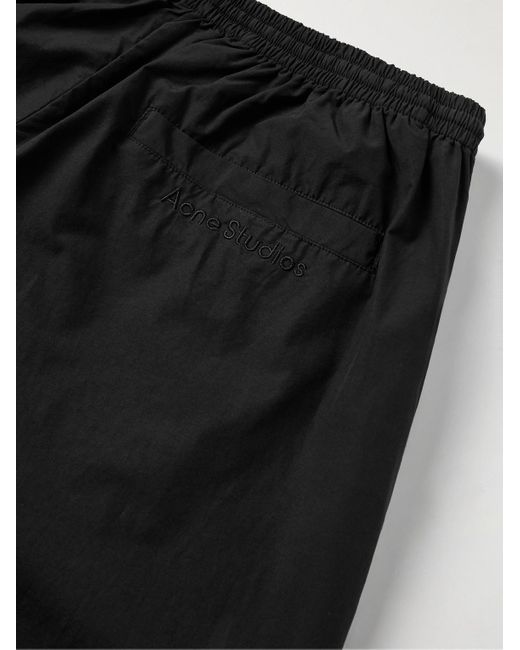 Pantaloni A Gamba Larga di Acne in Black da Uomo