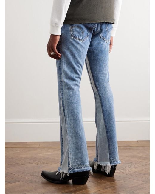 Two woman shop two man jeans