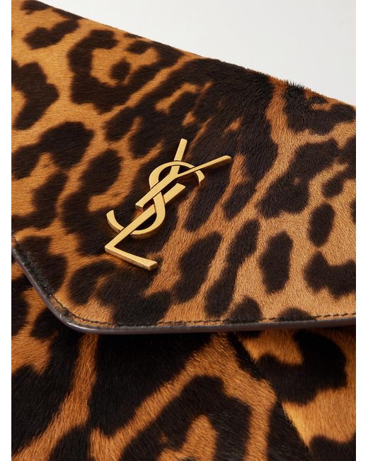 Logo-Appliquéd Leopard-Print Calf Hair Pouch di Saint Laurent in Metallic da Uomo