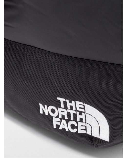 The North Face Black Nuptse Logo-embroidered Canvas-trimmed Padded Quilted Shell Tote Bag for men