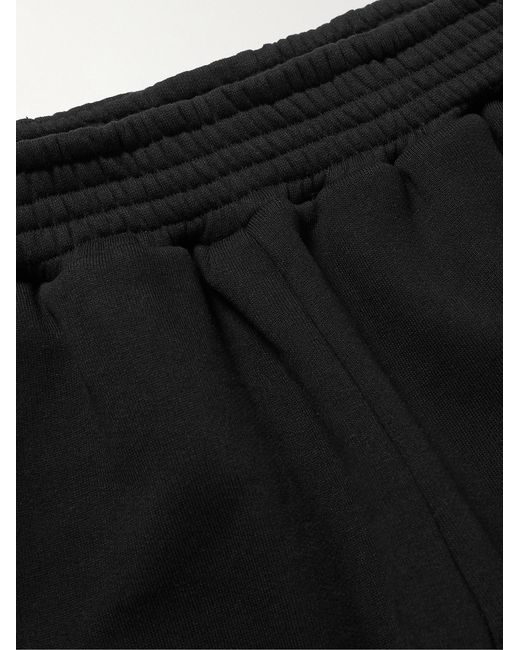Adish Black Tapered Logo-embroidered Cotton-jersey Sweatpants for men