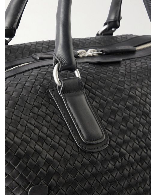 Officine Creative Black Woven Leather Weekend Bag for men
