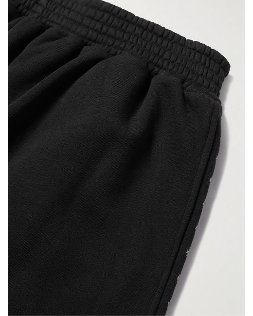 Adish Black Tapered Logo-embroidered Cotton-jersey Sweatpants for men