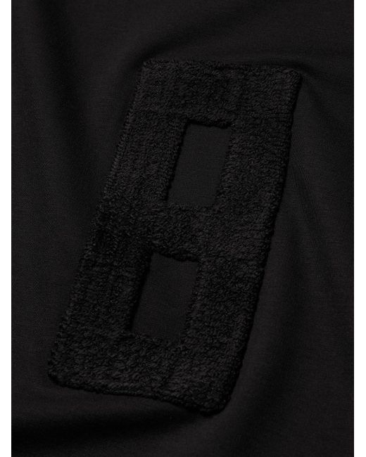 T-shirt oversize in jersey con finiture in bouclé di Fear Of God in Black da Uomo
