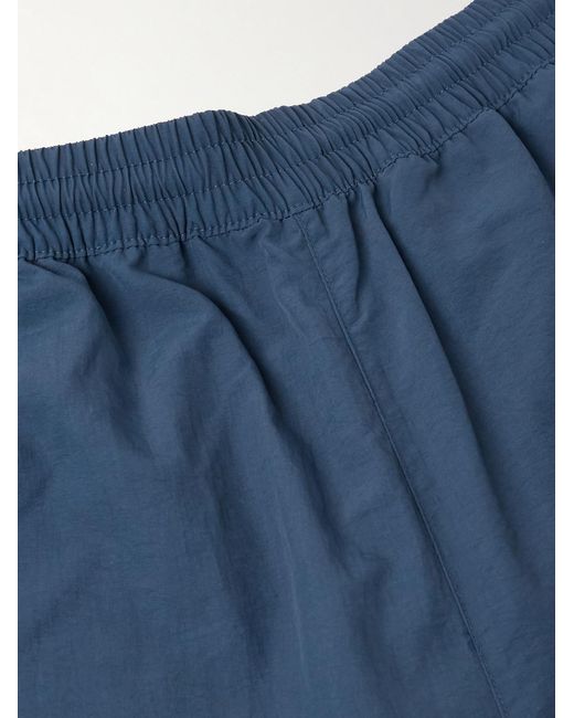 Willy Chavarria Blue Bad Boy Tapered Logo-Embroidered Piped Shell Trackpants for men