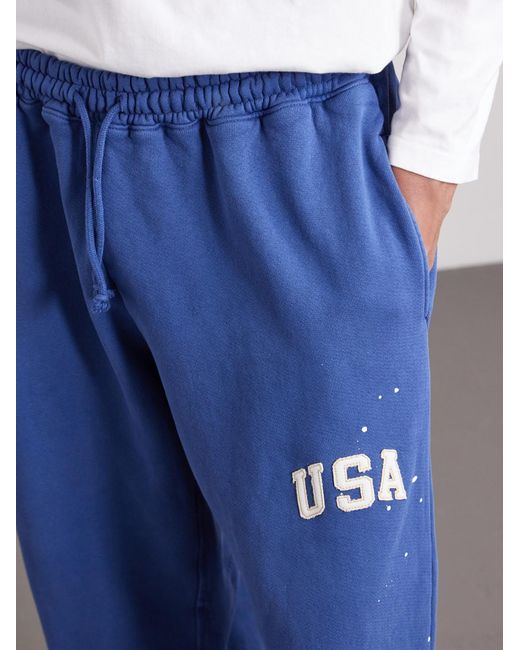 CHERRY LA Blue Usa Parachute Appliquéd Cotton Sweatpants for men