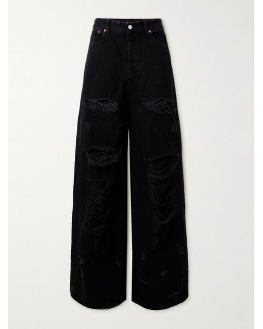 Jeans svasati effetto consumato Destroyed di Vetements in Black da Uomo
