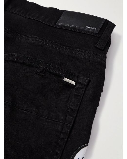 Amiri Black Skinny-fit Appliquéd Distressed Jeans for men