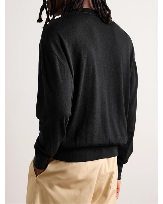 Pullover in lana merino con logo ricamato di AMI in Black da Uomo