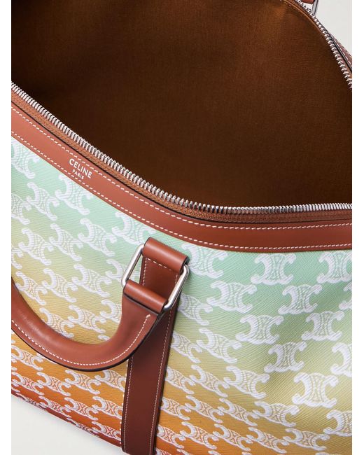 Medium Voyage Leather-Trimmed Logo-Print Coated-Canvas Holdall di Céline in Natural da Uomo