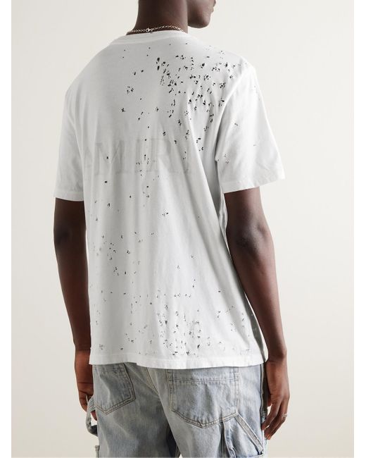 T-shirt in jersey di cotone effetto consumato con logo Shotgun di Amiri in White da Uomo