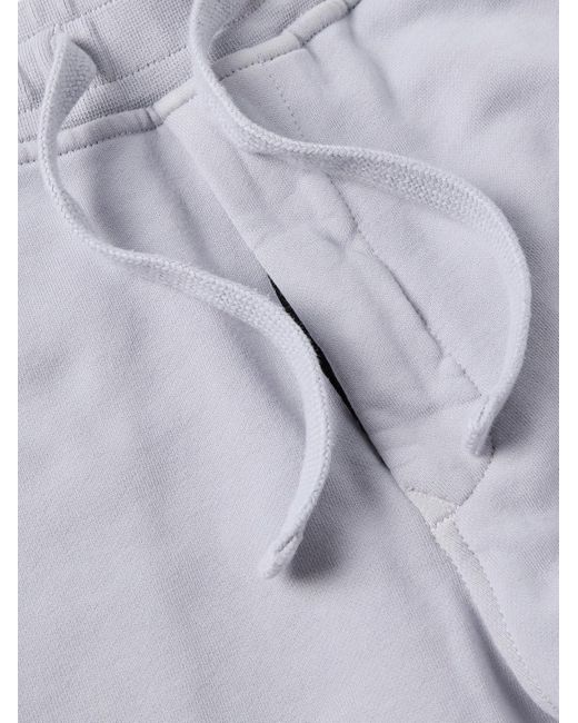 Stone Island Blue Tapered Logo-Appliquéd Garment-Dyed Cotton-Jersey Sweatpants for men