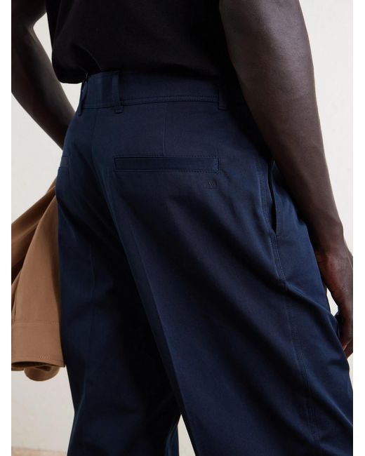 Valentino Garavani Blue Vlogo Straight-Leg Pleated Cotton-Gabardine Trousers for men