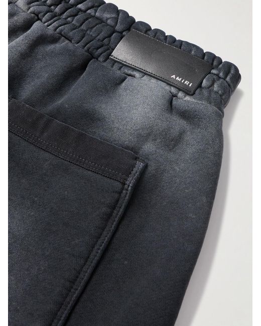 Amiri Black Wide-Leg Logo-Print Distressed Cotton-Jersey Drawstring Shorts for men