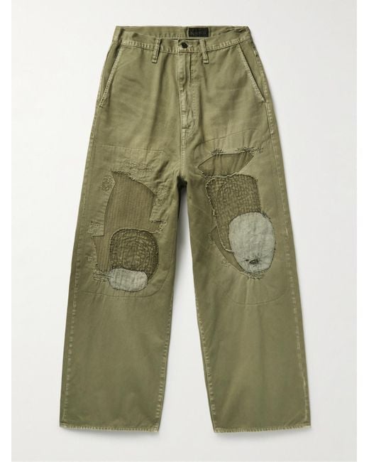Pantaloni a gamba larga in twill di cotone patchwork effetto consumato Katsuragi Port di Kapital in Green da Uomo