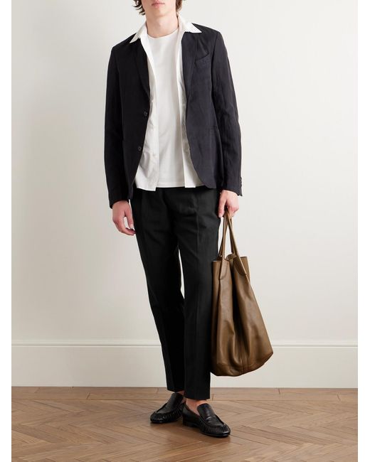 Officine Generale Black Drew Tapered Pleated Garment-Dyed Lyocell-Blend Trousers for men