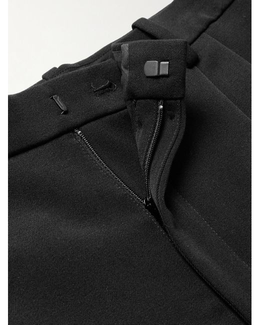 Pantaloni a gamba larga in lana grain de poudre con pinces di Saint Laurent in Black da Uomo