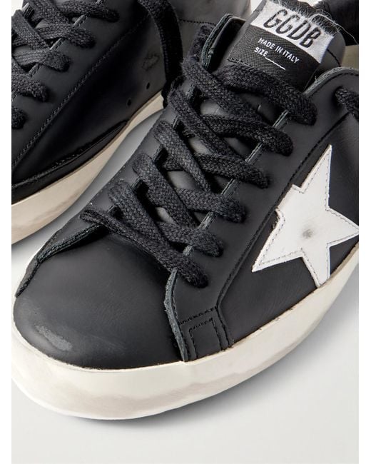 Golden Goose Deluxe Brand Black Super-star Distressed Leather Sneakers for men