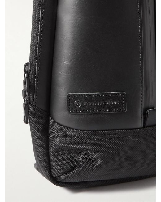 Master Piece Black Slick Logo-Appliquéd Leather And Cordura Barastec Nylon Sling Backpack for men