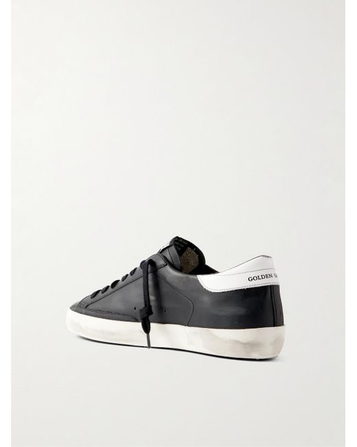 Golden Goose Deluxe Brand Black Super-star Distressed Leather Sneakers for men