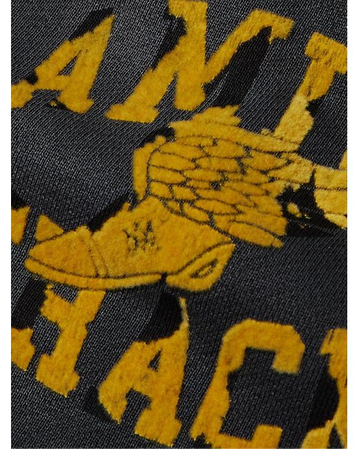 Shorts a gamba dritta in jersey di cotone effetto consumato con coulisse e logo floccato di Amiri in Black da Uomo