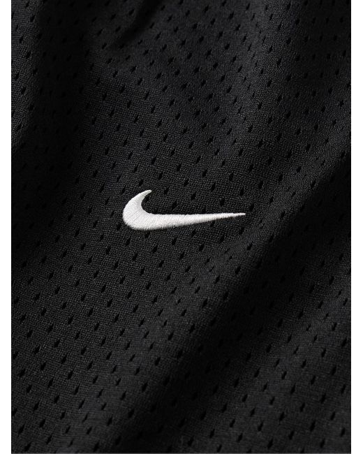 Shorts a gamba dritta in mesh con logo ricamato Solo Swoosh di Nike in Black da Uomo