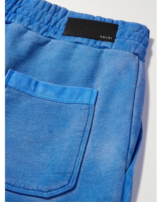 Amiri Blue Tapered Leather-Appliquéd Supima Cotton-Jersey Sweatpants for men