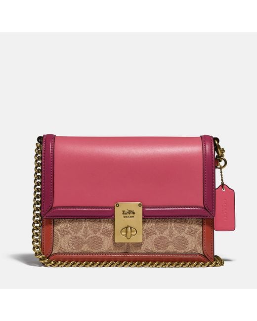 Coach hutton shoulder bag in signature canvas sale