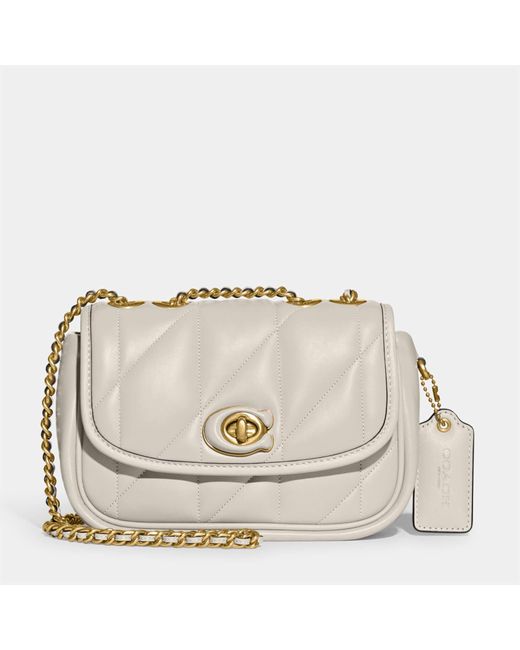 coach cream pillow bag