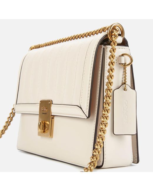 coach cream shoulder bag